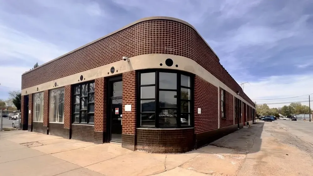 A curved red brick corner building